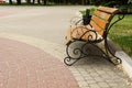 Wooden bench with forged fragments Royalty Free Stock Photo