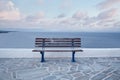 Wooden bench in front of the sea Royalty Free Stock Photo