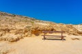 Wooden bench on the hillside facing the Mediterranean Sea for contemplation in Cape Greco. Captured in September 2023