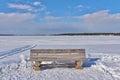 A wooden bench by the ice rink in LuleÃÂ¥ Royalty Free Stock Photo