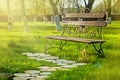 Wooden bench with iron forging pattern Royalty Free Stock Photo