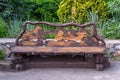 A wooden bench made with hand made of lumber