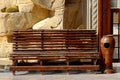Wooden bench near old yellow house facade Royalty Free Stock Photo