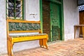 Wooden bench and an old vineyard house in Monor Royalty Free Stock Photo