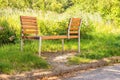 Wooden bench for pairs who can sit face to face Royalty Free Stock Photo