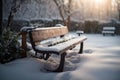 Wooden bench in the park covered with snow. Winter landscape. Royalty Free Stock Photo