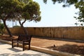 Wooden bench in park, malta, valetta, Royalty Free Stock Photo