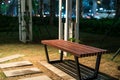 Wooden bench in the park at night Royalty Free Stock Photo
