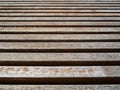 Wooden bench in the Park. the texture of the bench. Sticks stacked in a row Royalty Free Stock Photo