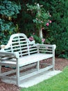 Wooden Bench And Pink Roses Royalty Free Stock Photo