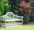 Wooden Bench And Red Roses