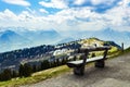 Wooden bench on Rigi Kulm Luzern Switzerland with landscape view Royalty Free Stock Photo