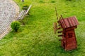 Wooden bench and rustic windmill