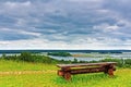 Wooden bench on the shore of Lake Braslav Royalty Free Stock Photo