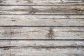 A wooden bench sitting next to a fence