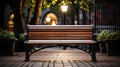 a wooden bench sitting on the side of a brick walkway Royalty Free Stock Photo