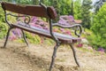 Wooden bench in spring near Biella Piedmont, Italy