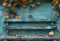 Wooden bench and wall with autumn leaves Royalty Free Stock Photo