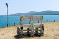 Wooden benches on the high seashore.