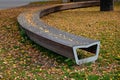 wooden benches by the lawn. wood paneled entice you to sit down Royalty Free Stock Photo