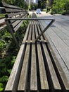 The wooden benches are positioned throughout the NYC High Line promenade New York