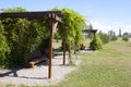 Wooden benches under a wooden porch