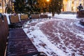 Wooden benches in the winter city park. Gomel, Belarus