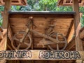 A wooden bicycle suspended under the roof of a bicycle station in the Kalety Commune in Poland