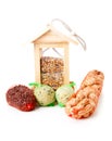 Wooden bird feeder house with food Royalty Free Stock Photo