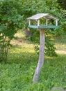 Wooden bird house nesting box Birdhouse in shape of real house with window