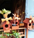 Wooden bird house on shopping street Royalty Free Stock Photo