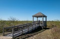 Wooden bird watching shelter hut for observing wildlife in Port Aransas, Texas on a sunny day.