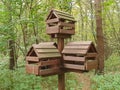 Wooden birdhouse in the forest