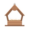 Wooden birdhouse with nest. Comfortable house frame for birds from wooden planks. Royalty Free Stock Photo