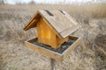 Wooden birdhouse outdoors in a natural park