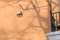 Wooden birdhouse for small wintering birds in the cold winter outdoor in city Royalty Free Stock Photo