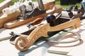 Wooden blank for the deck of a musical instrument lies on a table in the carpentry workshop against the background of the tools