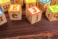 Wooden block alphabet lay on wooden floor. creative photo