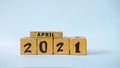 Wooden block calendar with a focus on April 2021