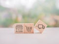 Wooden block with online shopping and e-commerce icons set
