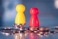 Wooden block people shape on stack coins using as business