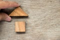 Wooden block puzzle in home shape wait for completion & x28;Concept f Royalty Free Stock Photo