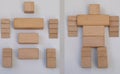 Wooden block puzzle toy, put together the shape of a robot. Concept of creating intelligent children