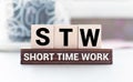 wooden block with the text SHORT TIME WORK Royalty Free Stock Photo