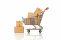 Wooden block with trolley and paper boxes symbolize shopping success