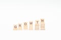 Wooden blocks as a step with the inscription GROWTH. Business concept. Free space for text