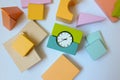 Wooden blocks with clock, top view. Early education, eco-friendly toys