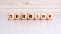 wooden blocks displaying the word 'Sponsor' arranged on a glossy gray surface Royalty Free Stock Photo