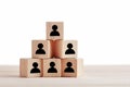 Wooden blocks with employee icon on white background. Leadership, human resources management, recruitment or corporate hierarchy