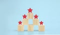 Wooden blocks with the five star symbol Increase rating